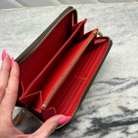 Louis Vuitton wallet 7.5 inches x 4 inches. Just a few years old. Authentic. - Picture 3 of 4